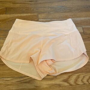 Light orange Lululemon shorts